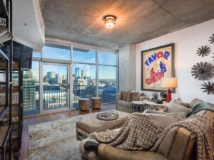 picture of a living room in a luxury condo with views of downtown Denver.